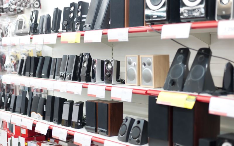 Wired and Wireless Speakers on Store Shelf